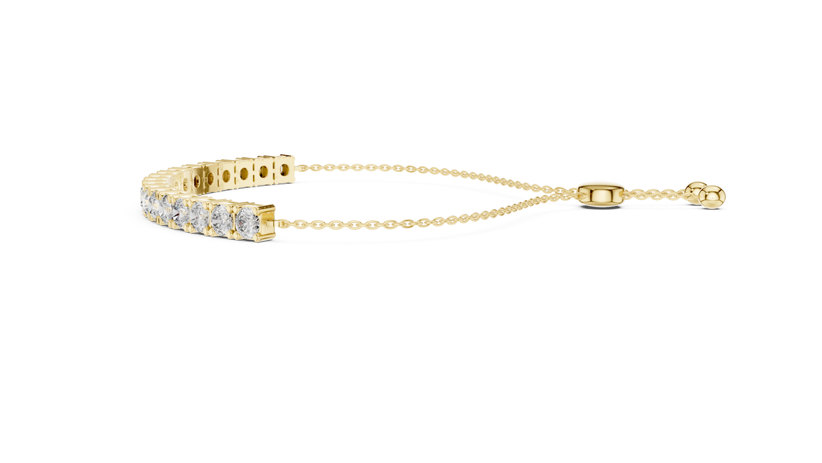Gold bracelet with diamond accents on a white background