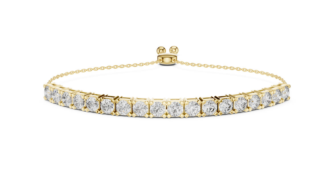 Rose gold bracelet with clear gemstones on a white background