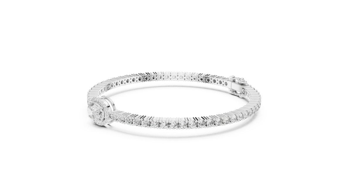 Silver bracelet with clear stones on a white background