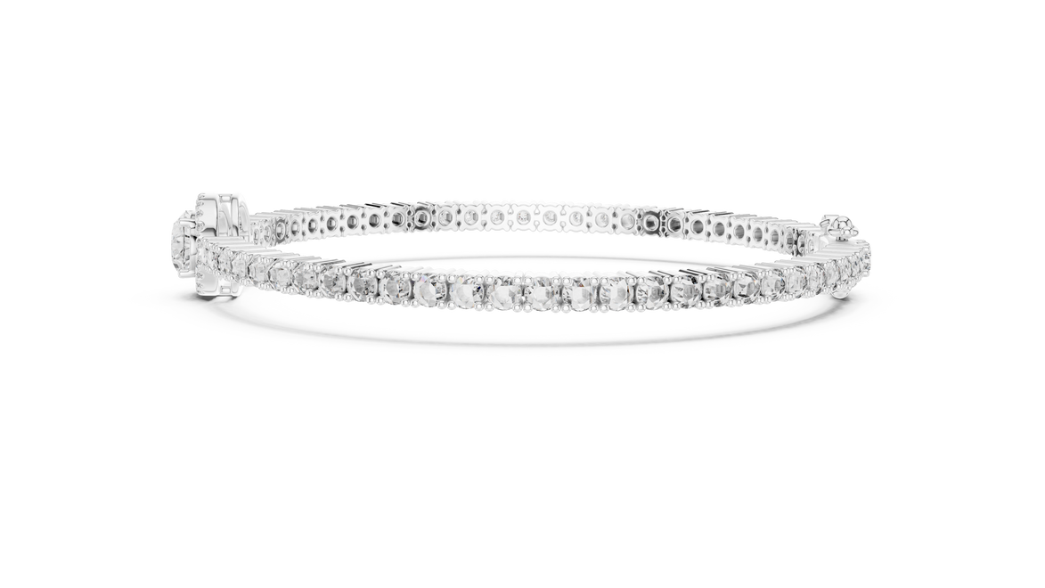 Delicate silver bracelet with small diamonds on a white background