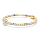 Gold ring with embedded diamonds on a white background