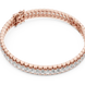 Rose gold bracelet with clear stones on a white background