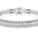 Silver bracelet with rectangular gemstones on a white background