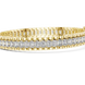Gold bracelet with diamond accents on a white background