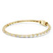 Gold and silver bracelet on a white background