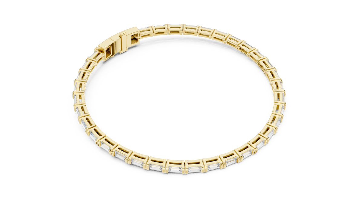 Gold bracelet with a white stone on a white background