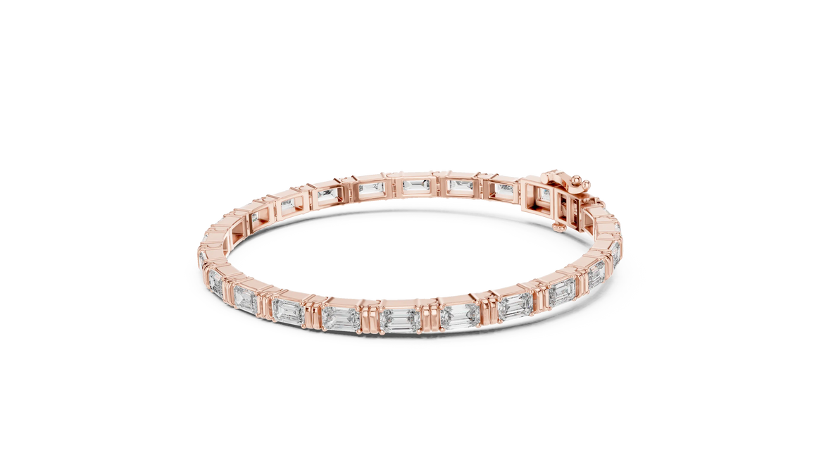 Rose gold bracelet with diamond accents on a white background