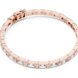 Rose gold bracelet with clear stones on a white background