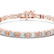 Rose gold bracelet with clear gemstones on a white background