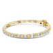 Gold bracelet with diamond accents on a white background