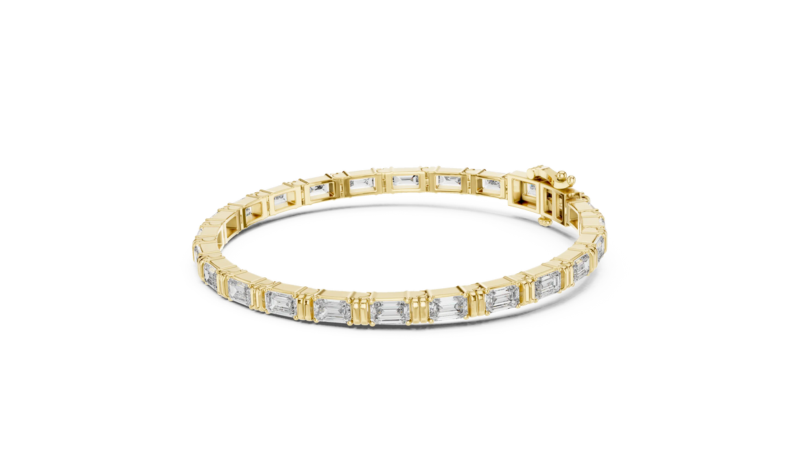 Gold bracelet with diamond accents on a white background