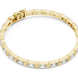 Gold bracelet with clear stones on a white background