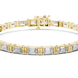 Gold bracelet with baguette-cut diamonds on a white background