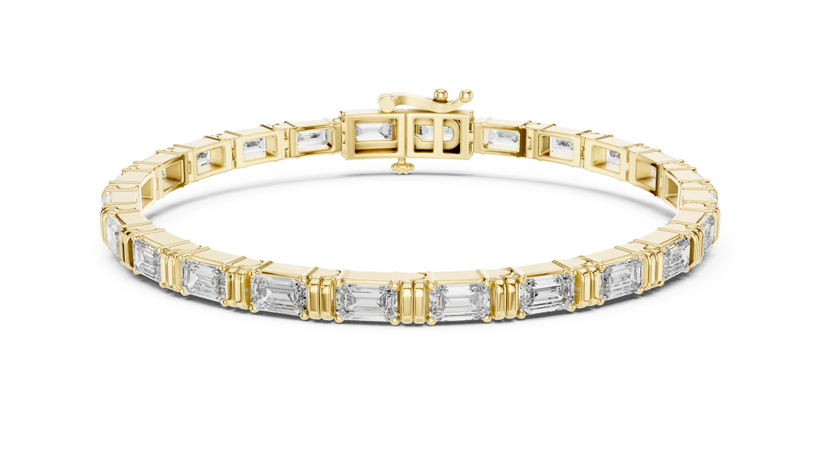 Gold bracelet with baguette-cut diamonds on a white background