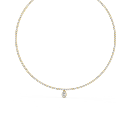 Gold necklace with a small pendant on a white background