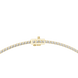 Gold bracelet with diamond accents on a white background