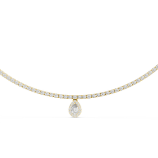 Gold necklace with a teardrop pendant on a white background