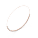 Gold necklace with clear stones on a white background