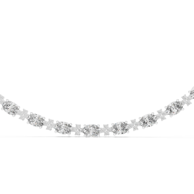 Silver necklace with clear stones on a white background