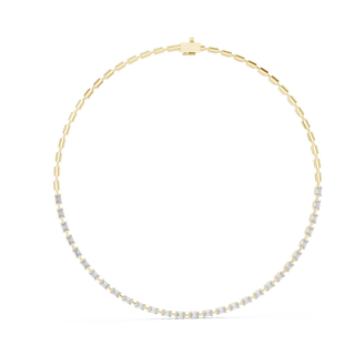 Gold and silver beaded necklace on a white background