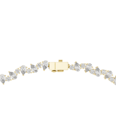 Gold bracelet with clear gemstones on a white background