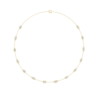 Gold necklace with small diamonds on a white background