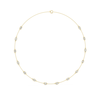 Gold necklace with small diamonds on a white background