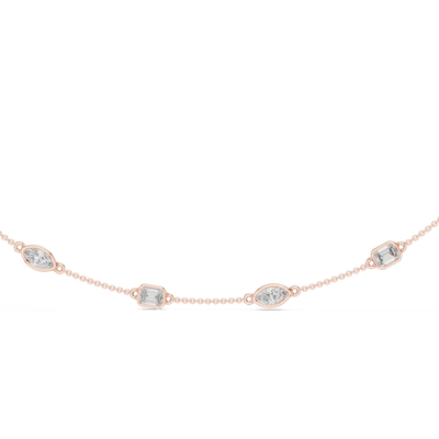 Rose gold necklace with diamonds on a white background