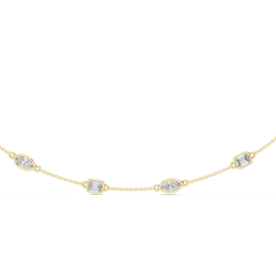 Gold necklace with diamond-like stones on a white background
