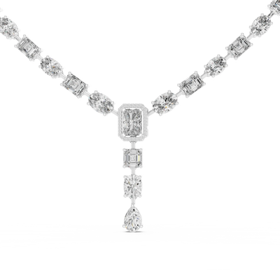 Diamond necklace with gold and silver chain on a white background