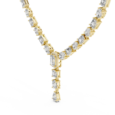Gold necklace with diamond pendants on a white background