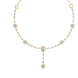 Gold and diamond necklace on a white background