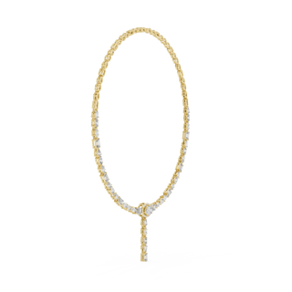 Gold necklace with small beads on a white background