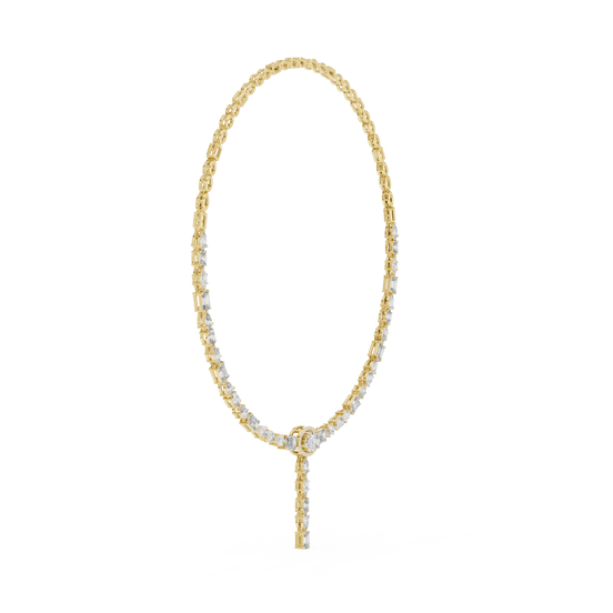 Gold necklace with small beads on a white background