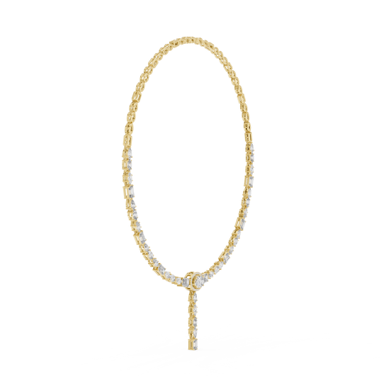 Gold necklace with small beads on a white background