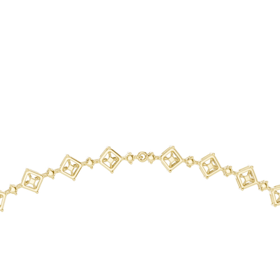 yellow gold necklace with diamond-like stones on a white background