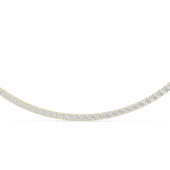 Gold and diamond necklace on a white background