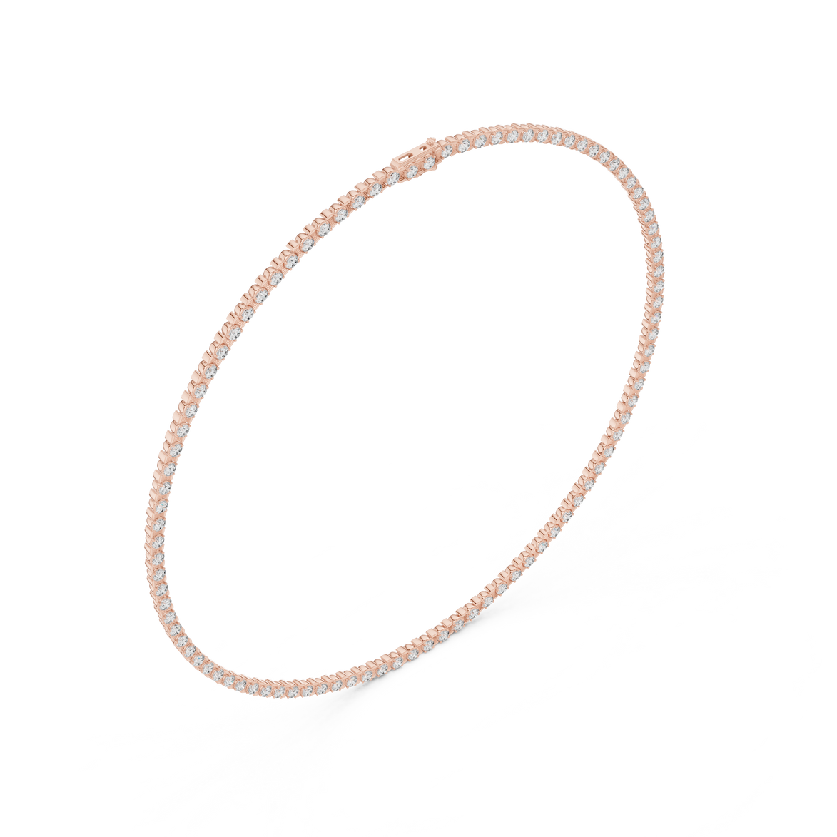Thin pink beaded necklace on a white background