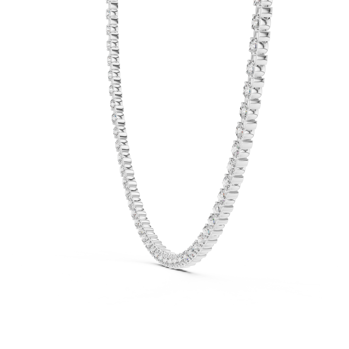 Silver necklace with rectangular links on a white background