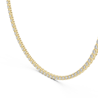 Gold necklace with diamonds on a white background