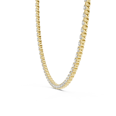 Gold chain necklace with diamond accents on a white background