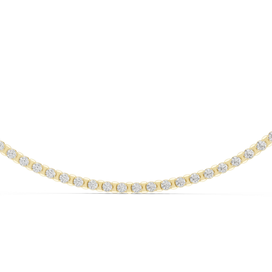 Gold necklace with diamonds on a white background