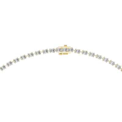 Gold necklace with clear stones on a white background