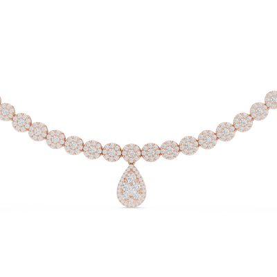 Rose gold necklace with diamond teardrop pendant on a white background