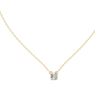emerald cut diamond solitaire pendant in yellow gold