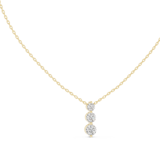 round diamond three stone drop pendant in yellow gold