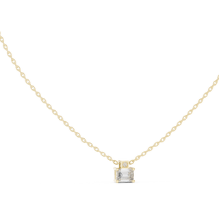 emerald cut diamond pendant in yellow gold