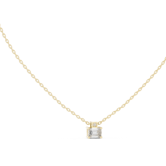 emerald cut diamond pendant in yellow gold