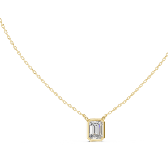 Emerald cut lab grown diamond bezel solitaire pendant in yellow gold