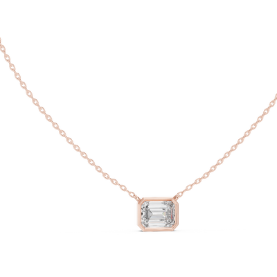 Emerald cut east-west lab grown diamond bezel pendant in rose gold